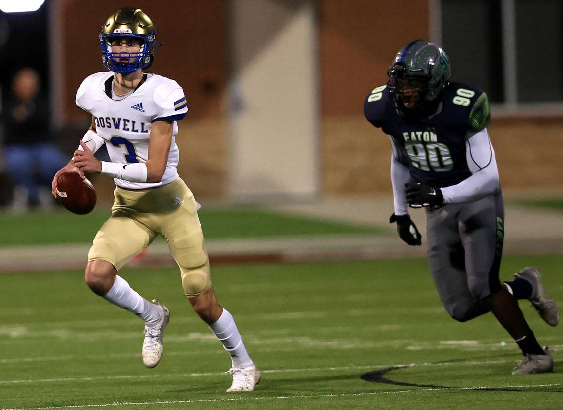 Fort Worth Boswell quarterback Sawyer Farr (3) looks to pass, as he is pursued by Eaton defensive end Chancellor Owens (90) during the first half of the 6A Bi-District Region I Division II High School Football playoff game played at Northwest ISD Stadium on Thursday, November 11, 2021, in Justin. (Steve Nurenberg/Special to the Star-Telegram)