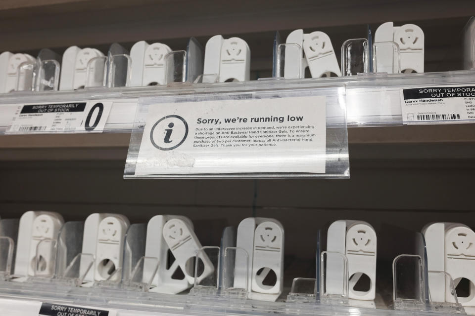 Empty shelves where hand sanitiser is usually stocked inside a London supermarket.