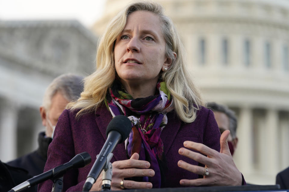 Rep. Abigail Spanberger, D-Va., speaks during a news conference with the Problem Solvers Caucus about the expected passage of the emergency COVID-19 relief bill, Monday, Dec. 21, 2020, on Capitol Hill in Washington. Congressional leaders have hashed out a massive, year-end catchall bill that combines $900 billion in COVID-19 aid with a $1.4 trillion spending bill and reams of other unfinished legislation on taxes, energy, education and health care. (AP Photo/Jacquelyn Martin)