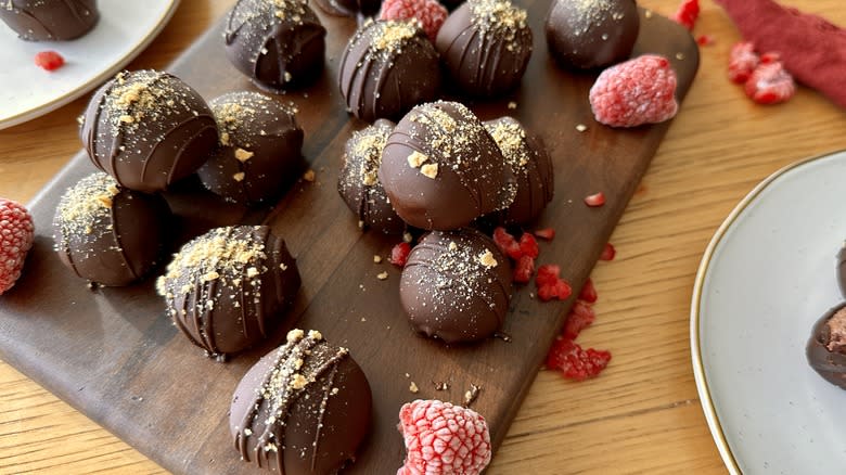 Dark chocolate raspberry cheesecake truffles