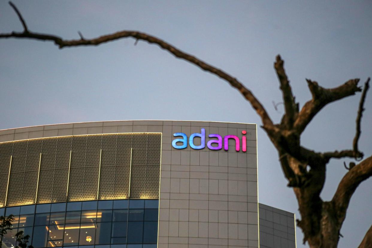 Signage atop the Adani Group headquarters in Ahmedabad, India, on Wednesday, Feb. 1, 2023. 
