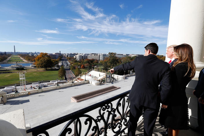 <p>House Speaker Paul Ryan of Wisconsin, left, shows President-elect Donald Trump and his wife, Melania, the view of the inaugural stand of Pennsylvania Avenue from the speaker’s balcony on Capitol Hill in Washington, Nov. 10, 2016. (AP Photo/Alex Brandon) </p>