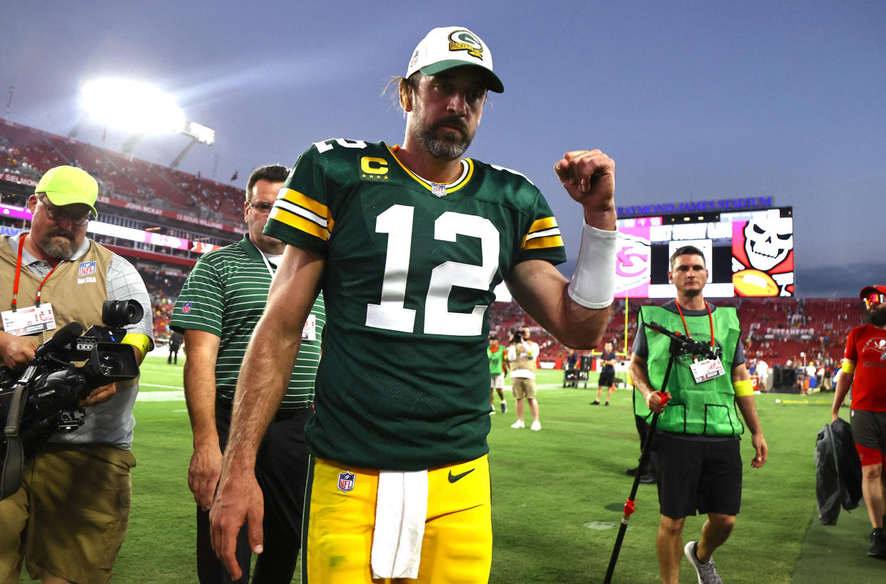 Sep 25, 2022; Tampa, Florida, USA; Green Bay Packers quarterback Aaron Rodgers (12) celebrates after they beat the Tampa Bay Buccaneers during the second half at Raymond James Stadium. Mandatory Credit: Kim Klement-USA TODAY Sports