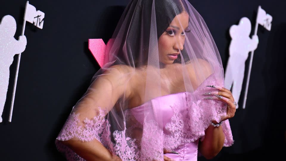 Nicki Minaj went for bridal Barbiecore in a pink gown by Dolce & Gabbana. - Angela Weiss/AFP/Getty Images