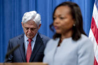 Assistant Attorney General for Civil Rights Kristen Clarke, right, accompanied by Attorney General Merrick Garland, left, speaks at a news conference at the Department of Justice in Washington, Thursday, Aug. 5, 2021, to announce that the Department of Justice is opening an investigation into the city of Phoenix and the Phoenix Police Department. (AP Photo/Andrew Harnik)