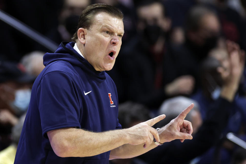 Illinois coach Brad Underwood gestures during the second half of the team's NCAA college basketball game against Rutgers on Wednesday, Feb. 16, 2022, in Piscataway, N.J. (AP Photo/Adam Hunger)