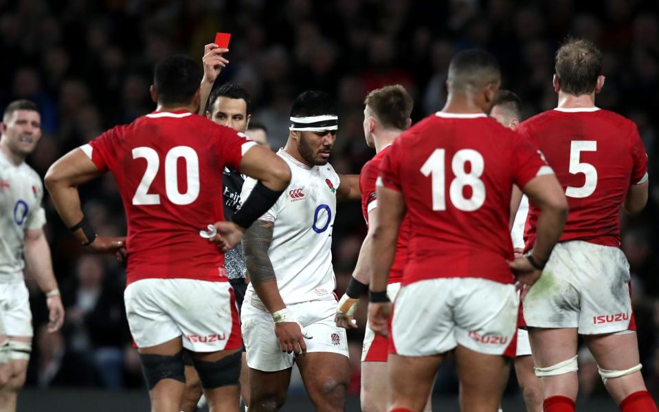 MARCH 07: Manu Tuilagi of England is shown a red card from referee Ben O'Keeffe during the 2020 Guinness Six Nations match between England and Wales at Twickenham Stadium on March 07, 2020 in London, England - GETTY IMAGES