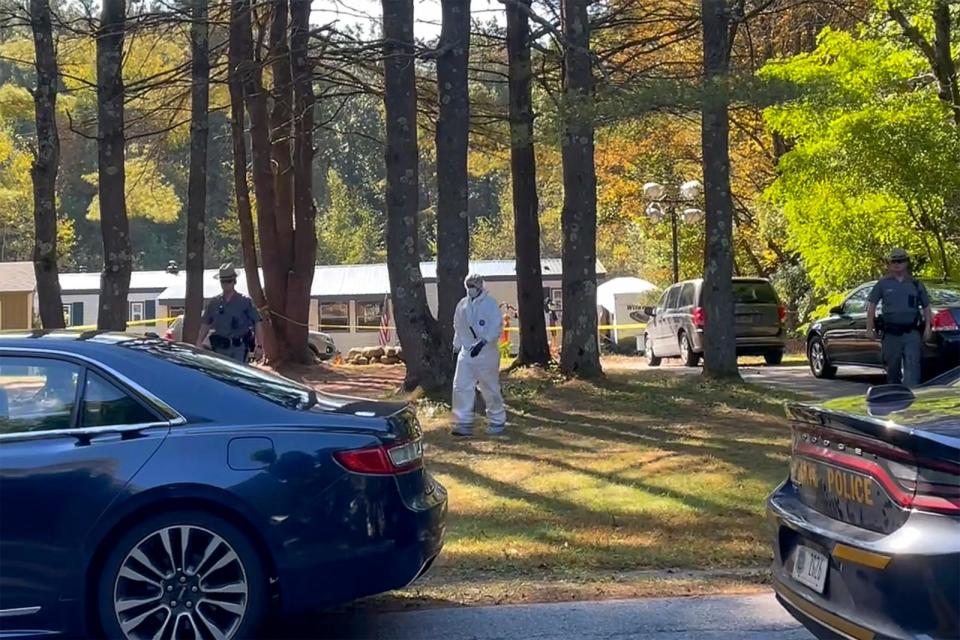 PHOTO: In this image taken from video, New York State police and crime scene investigators walk across the property, Oct. 3, 2023, in Milton, N.Y., where Craig N. Ross Jr. was found with a 9-year-old he is suspected of kidnapping. (Maysoon Kahn)