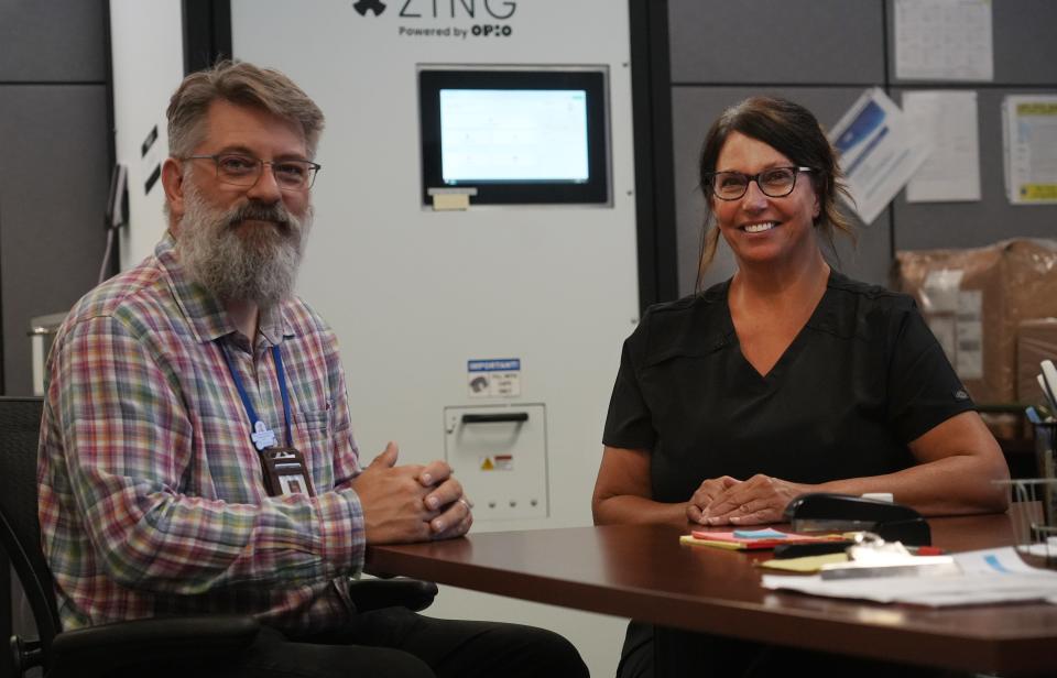 CompDrug CEO Dustin Mets and director of nursing Tawnya Tucker say they are happy with the Zing automated dose machine made by Opio, which has been in use at CompDrug's North Side dispensary.