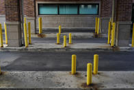 A drive-thru teller sits vacant at a Bank of America branch that closed its doors in the Auburn Gresham neighborhood in Chicago, Tuesday, Aug. 25, 2020. The community has a long history of trouble attracting and maintaining businesses. Auburn Gresham suffers from decades of disinvestment and residents now have to travel outside the community for health care or groceries. That creates enormous hardship for the elderly. (AP Photo/David Goldman)