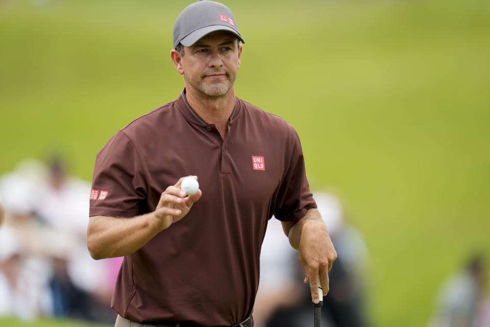 Adam Scott, of Australia, waves after making a putt on the fifth hole during the second round of the PGA Championship golf tournament at the Valhalla Golf Club, Friday, May 17, 2024, in Louisville, Ky. (AP Photo/Jeff Roberson)