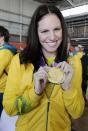 London 2012 Olympic athlete Emily Seebohm arrives at Sydney Airport Wednesday August 15, 2012 . (AAP Image/Mick Tsikas) NO ARCHIVING