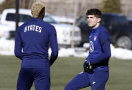 U.S. men's national team soccer forward Christian Pulisic, right, and forward Gyasi Zardes talk during practice in Columbus, Ohio, Wednesday, Jan. 26, 2022, ahead of Thursday's World Cup qualifying match against El Salvador. (AP Photo/Paul Vernon)