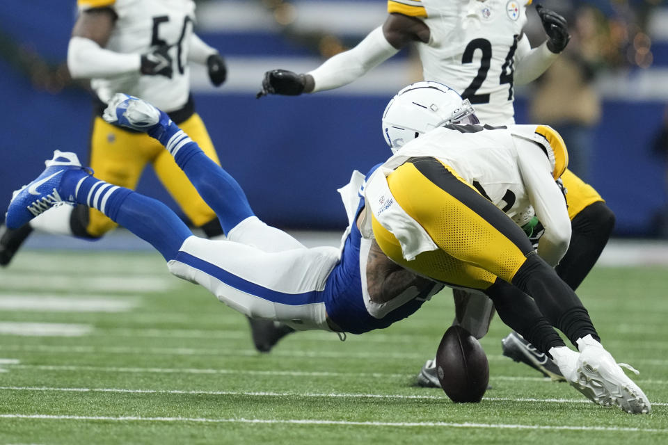 Indianapolis Colts wide receiver Michael Pittman Jr., left, is hit by Pittsburgh Steelers safety Damontae Kazee, right, during the first half of an NFL football game in Indianapolis Saturday, Dec. 16, 2023. Pittman was injured on the play and Kazee was ejected from the game. (AP Photo/Michael Conroy)