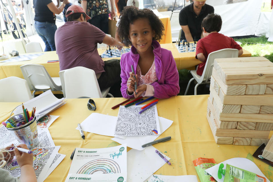 NEW YORK, NY - MAY 21:  Children enjoy activities at the Kids Zone at Harlem EatUp!'s Third Annual Festival Weekend at Morningside Park on May 21, 2017 in New York City.  (Photo by Rob Kim/Getty Images for Harlem EatUp!)