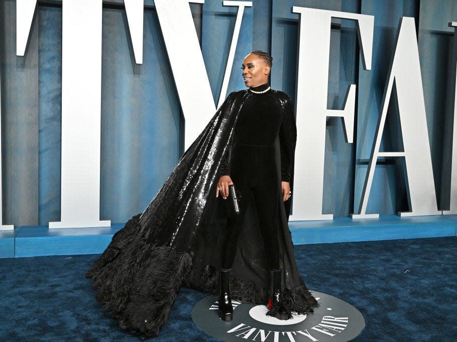 Billy Porter attends the 2022 Vanity Fair Oscar Party in a black sparkly cape