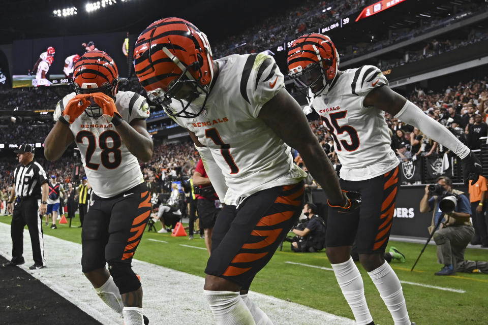 Cincinnati Bengals wide receiver Ja'Marr Chase (1) celebrates after scoring a touchdown against the Las Vegas Raiders during the second half of an NFL football game, Sunday, Nov. 21, 2021, in Las Vegas. (AP Photo/David Becker)