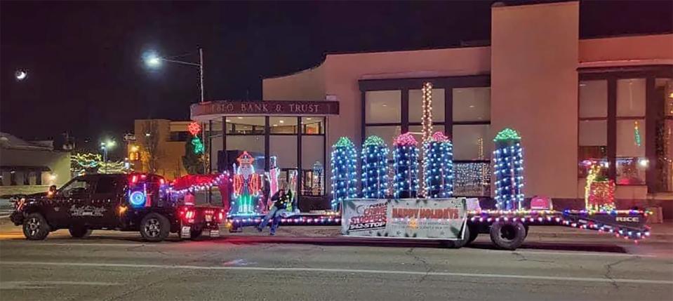 The Pueblo Crime Stoppers Float paid homage to the steel mill's historic skyline at a recent Pueblo Downtown Association Parade of Lights.