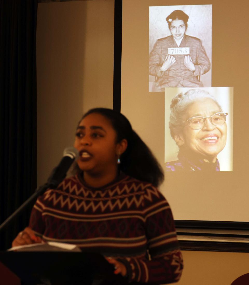 Courtney Henderson portrays Rosa Parks during an homage to influential Black leaders at the library on Saturday, Feb. 4, 2023.