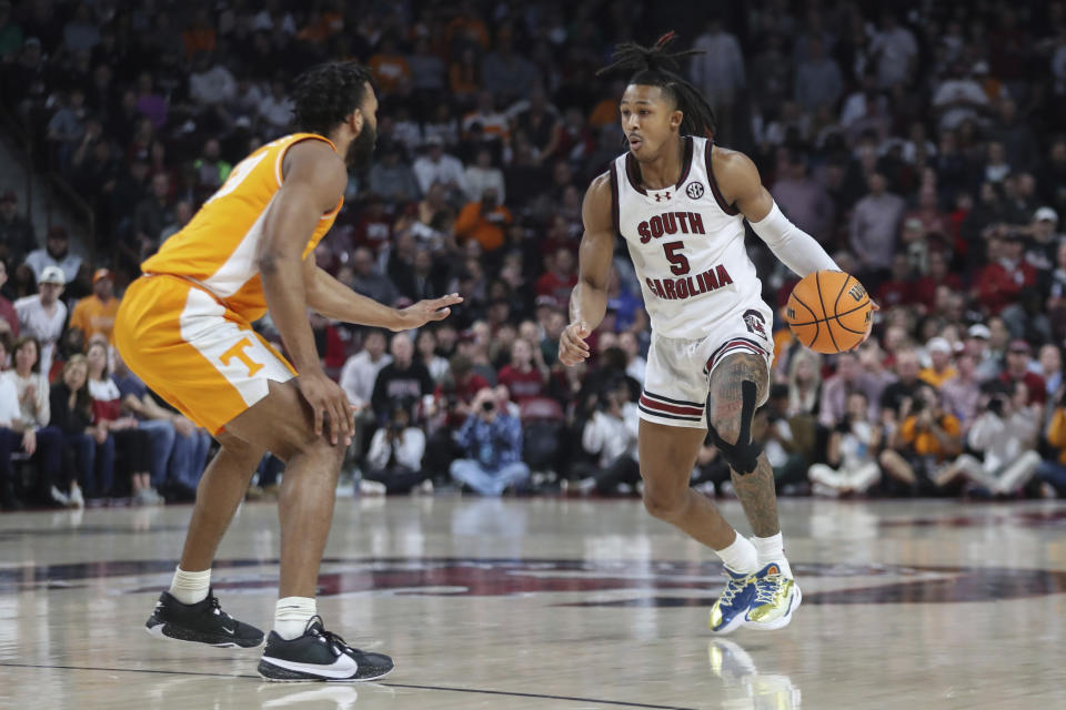 South Carolina guard Meechie Johnson (5) looks to drive to the basket during the first half of the team's NCAA college basketball game against Tennessee on Wednesday, March 6, 2024, in Columbia, S.C. (AP Photo/Artie Walker Jr.)