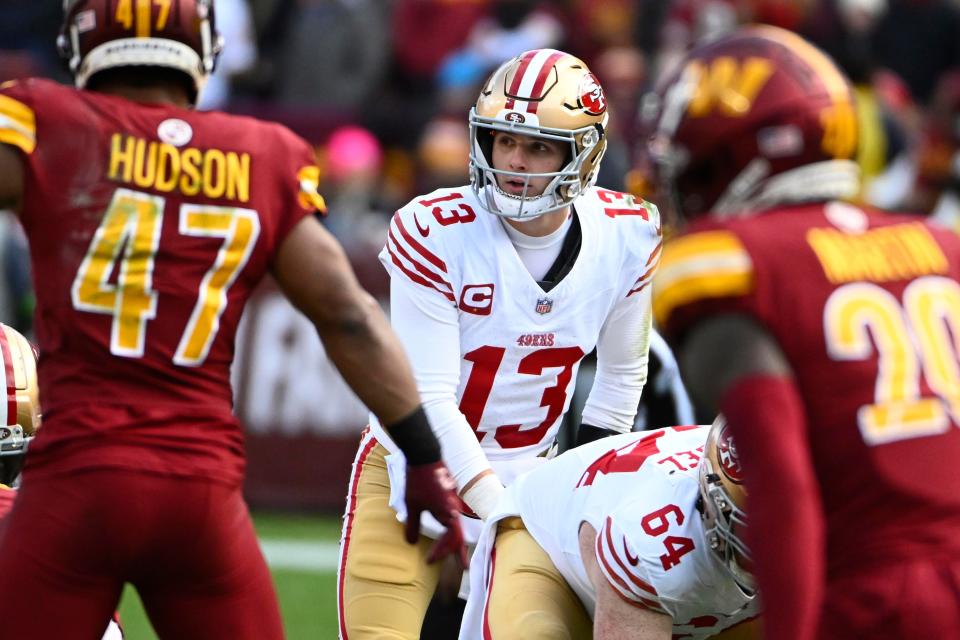 San Francisco 49ers quarterback Brock Purdy at the line of scrimmage against the Washington Commanders during the first half at FedExField, Dec. 31, 2023 in Landover, Maryland.