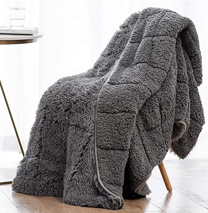 If you're a sucker for anything super soft and fluffy, say hello to this effortlessly chic shaggy faux fur-weighted blanket. It's warm and fuzzy while still looking elevated, and comes in six colors in 15-pound and 20 pound-weights. Check the size chart to see which size the brand suggests for you. It's luxe, comfy and extra supportive, so you'll never want to take it off. Promising review: 