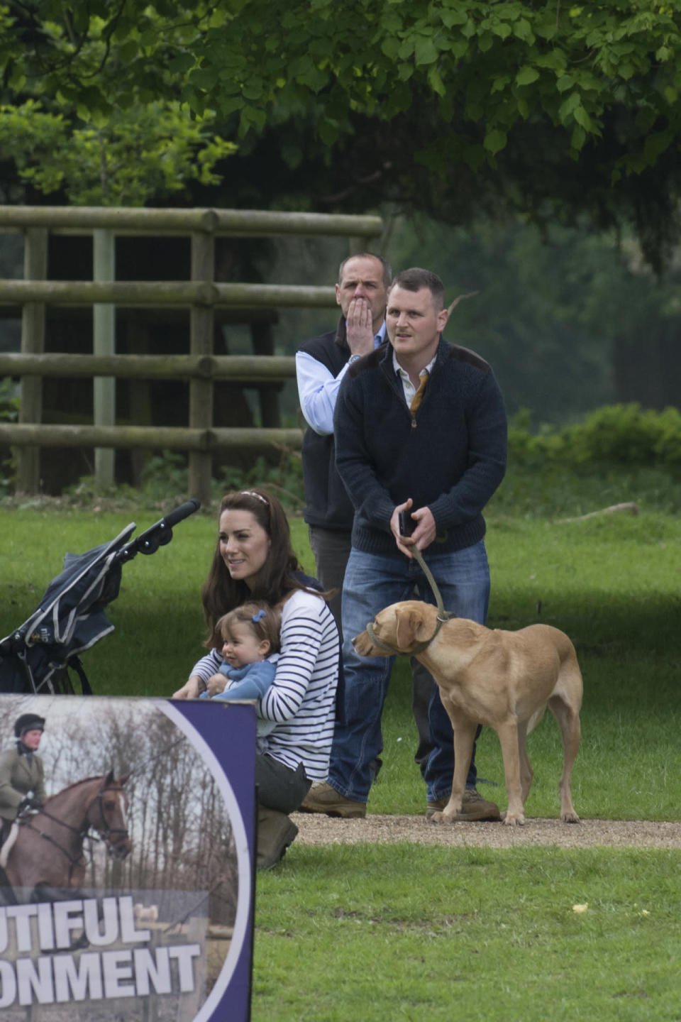 Princess Charlotte was also included in the day out, and looked sweet in a blue cardigan with matching bow.