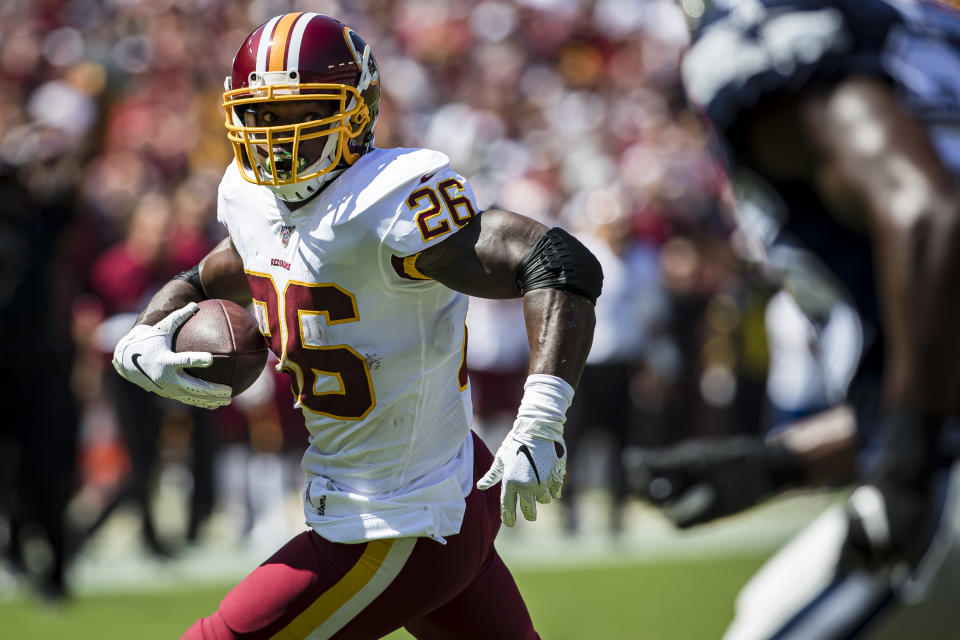 LANDOVER, MD - SEPTEMBER 15: Adrian Peterson #26 of the Washington Redskins runs with the ball against the Dallas Cowboys during the first half at FedExField on September 15, 2019 in Landover, Maryland. (Photo by Scott Taetsch/Getty Images)