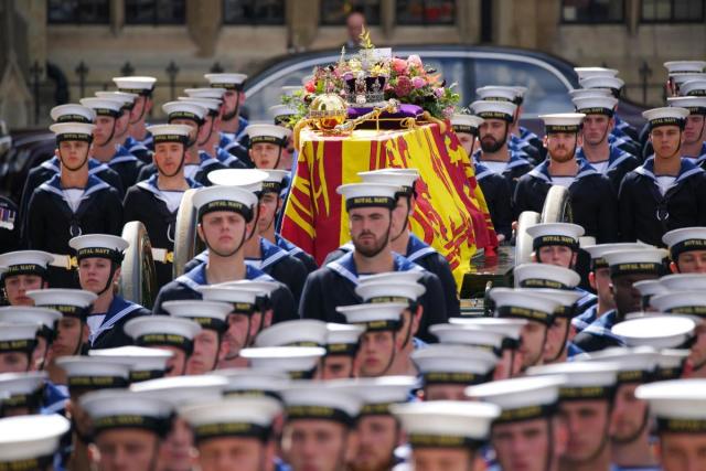 The coffin of Queen Elizabeth II being carried by pallbearers leaving the State Funeral held at Westminster Abbey, London. <i>(Image: Peter Byrne/PA)</i>