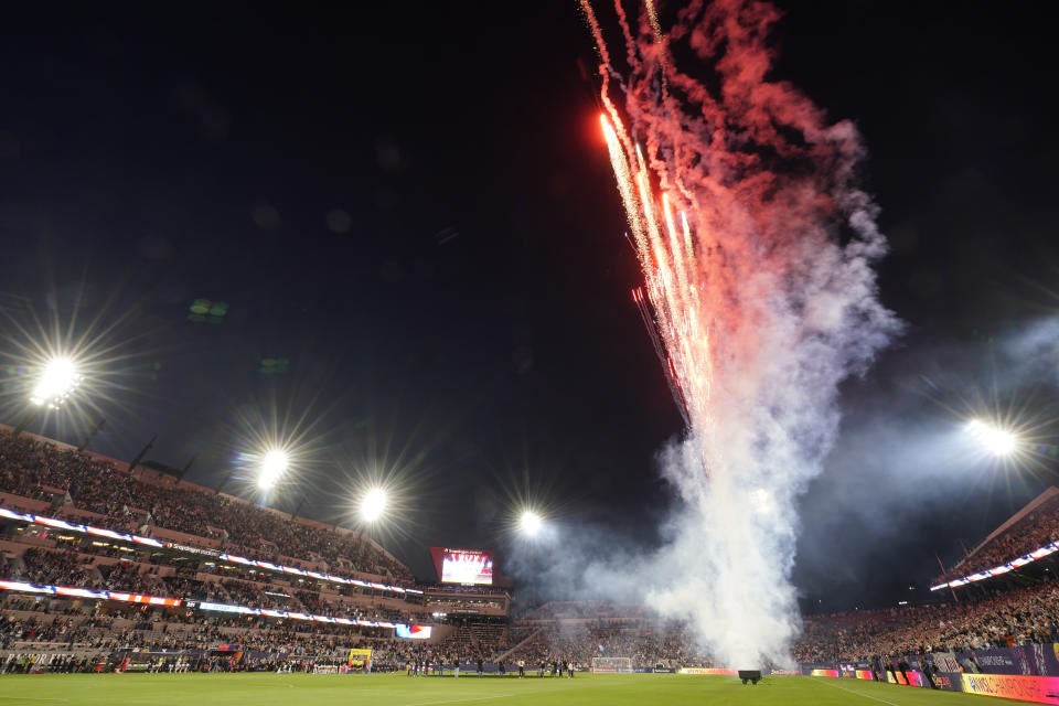 Fireworks explode before the NWSL Championship soccer game between OL Reign and NJ/NY Gotham, Saturday, Nov. 11, 2023, in San Diego. (AP Photo/Gregory Bull)