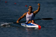 BEIJING - AUGUST 22: Tim Brabants of Great Britain celebrates winning the gold medal in the men's flatwater kayak single (K1) 1000m Men Final at the Shunyi Olympic Rowing-Canoeing Park on Day 14 of the Beijing 2008 Olympic Games on August 22, 2008 in Beijing, China. (Photo by Jeff Gross/Getty Images)
