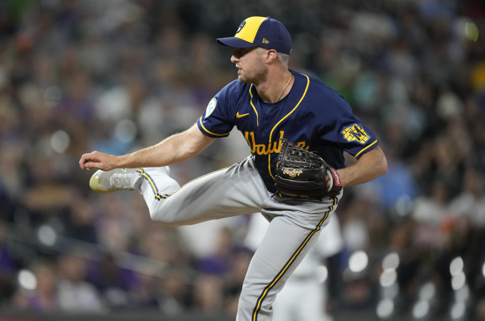 Milwaukee Brewers relief pitcher Trevor Richards works against the Colorado Rockies during the eighth inning of a baseball game Friday, June 18, 2021, in Denver. (AP Photo/David Zalubowski)