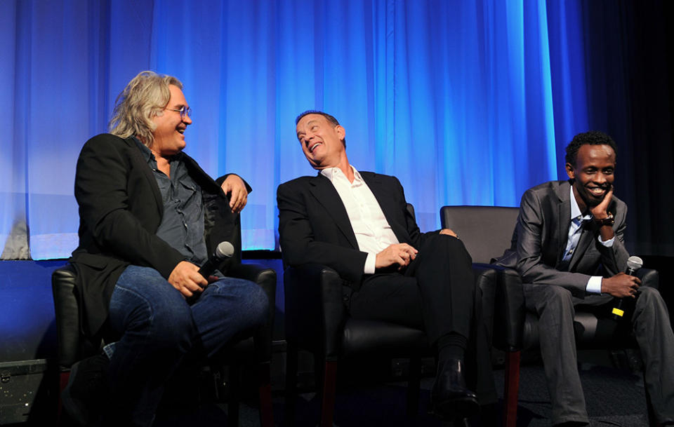 Paul Greengrass, Tom Hanks and Barkhad Abdi attend the Academy of Motion Picture Arts and Sciences official Academy members screening of "Captain Phillips" on October 7, 2013 in New York City.