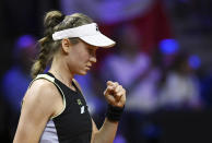 Kazakhstan's Elena Rybakina during the women's singles semifinal match against Poland's Iga Swiatek at the WTA Tour in Stuttgart, Germany, Saturday April 20, 2024. (Marijan Murat/dpa via AP)