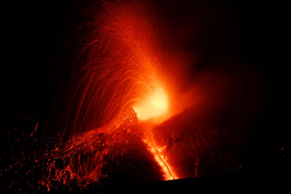 <p>Mount Etna, Europe’s most active volcano, spews lava during an eruption, near the Sicilian town of Catania, southern Italy, Tuesday, Feb. 28, 2017. (Antonio Parrinello/Reuters) </p>