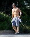 <p>Brad Falchuk goes shirtless on Thursday for a solo walk in Brentwood, California. </p>