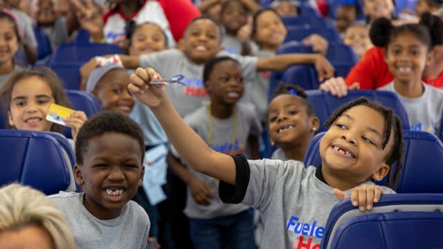 First graders on a Southwest airplane in their Dallas hangar.