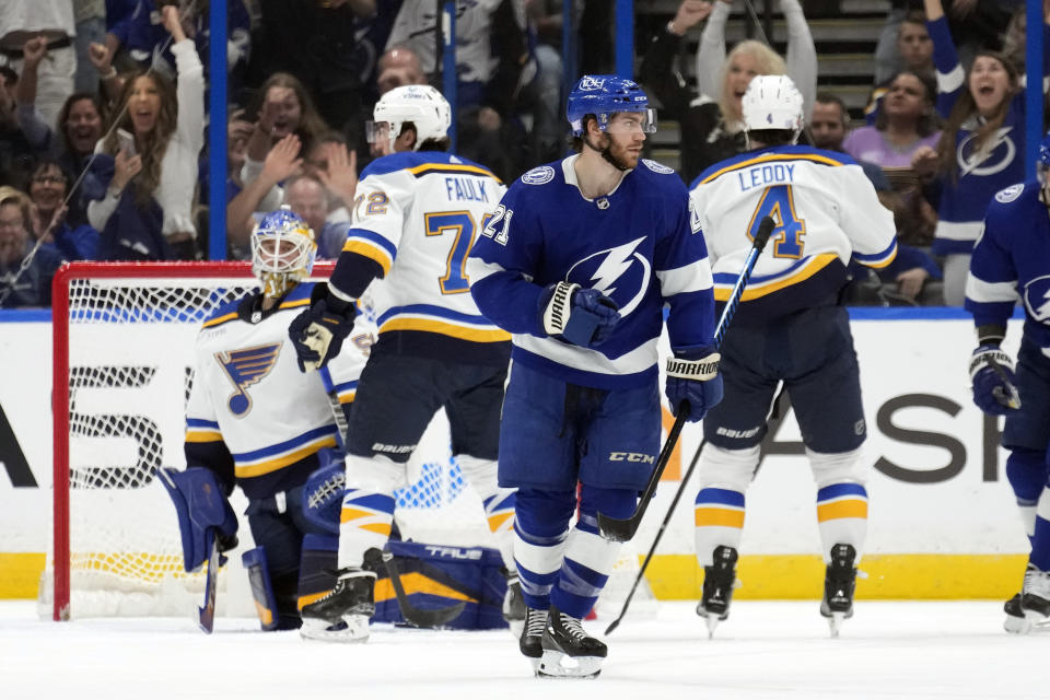 Tampa Bay Lightning center Brayden Point (21) celebrates after this goal against the St. Louis Blues during the first period of an NHL hockey game Friday, Nov. 25, 2022, in Tampa, Fla. (AP Photo/Chris O'Meara)