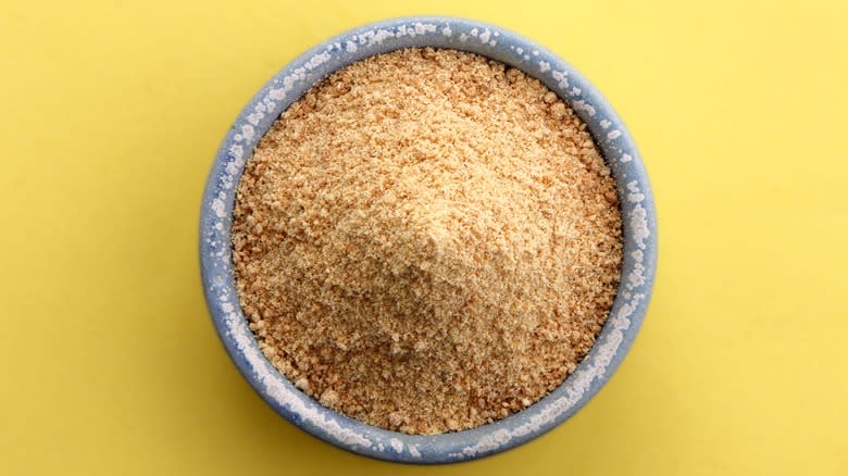 Asafoteida powder in grey bowl