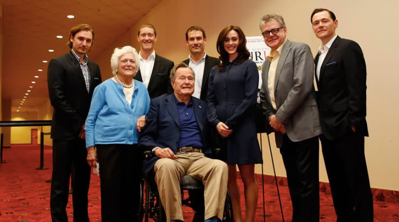 Lind, center, said the former president "touched" her twice during this photo opp and that former first lady Barbara Bush was aware. (Photo: Aaron M Sprecher/Invision for AMC/AP Images)