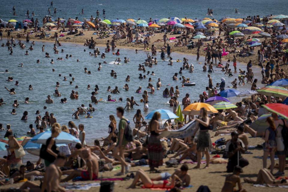 People at the beach in Barcelona, Spain