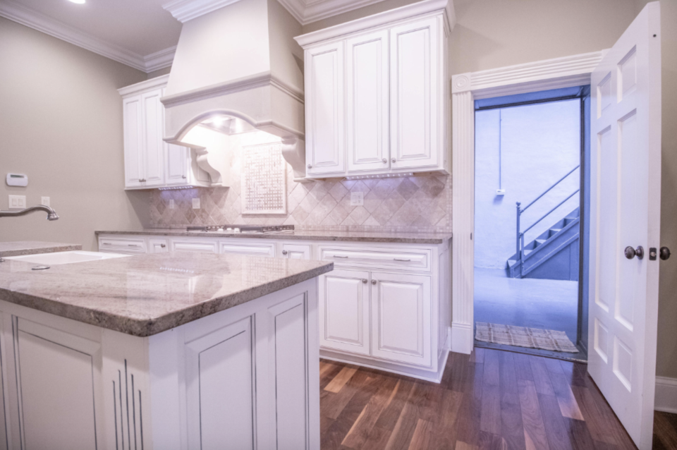 A secret door in the kitchen leads to the jail. (Photo: House of Brokers Realty)