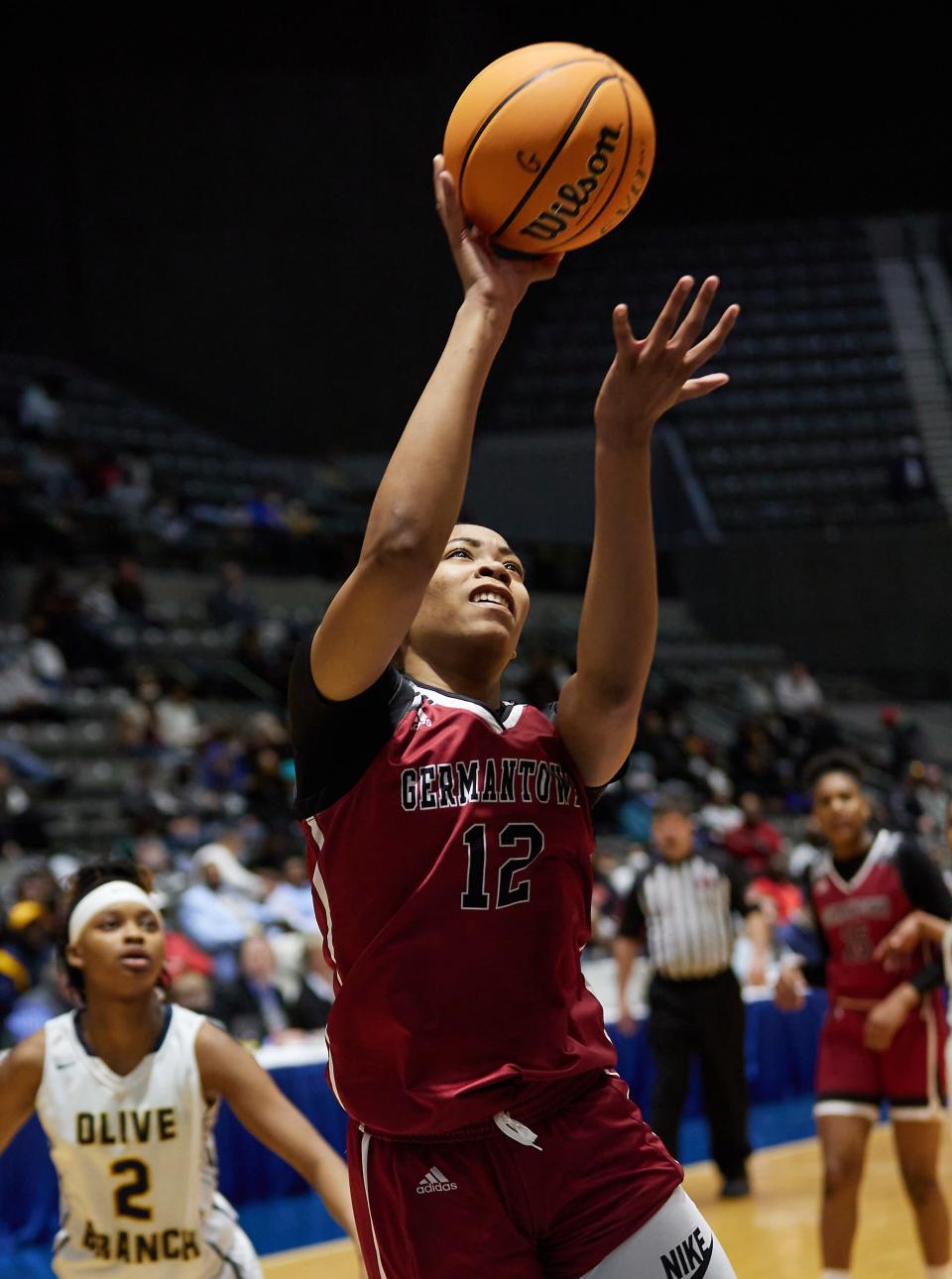 Germantown’s Alana Rouser (12) shoots against Olive Branch during the MHSAA Girls 6A Girls Championship Game held in the Mississippi Coliseum in Jackson, Mississippi. (Photo by Bob Smith)