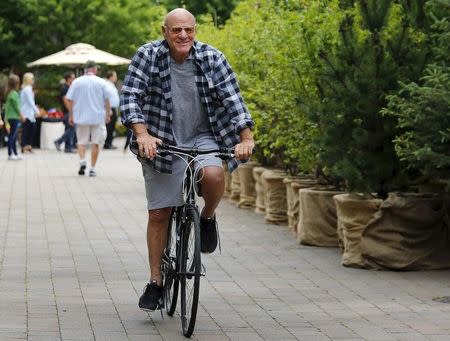 Barry Diller, Chairman and Senior Executive of IAC/InterActiveCorp and Expedia, Inc., rides a bike during the first day of the annual Allen and Co. media conference in Sun Valley, Idaho July 8, 2015. REUTERS/Mike Blake