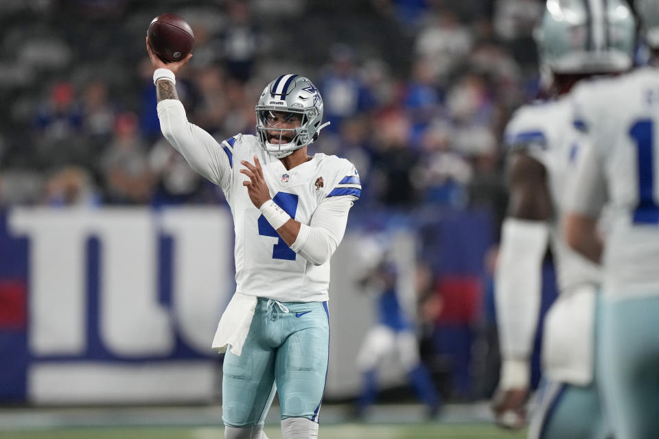 Dallas Cowboys quarterback Dak Prescott warms up before an NFL football game against the New York Giants, Sunday, Sept. 10, 2023, in East Rutherford, N.J. (AP Photo/Bryan Woolston)