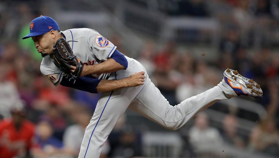 New York Mets pitcher Edwin Diaz works against the Atlanta Braves in the ninth inning of a baseball game Friday, Oct. 1, 2021, in Atlanta. (AP Photo/Ben Margot)