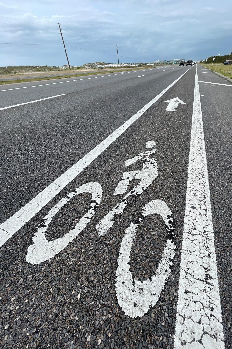 The bicycle lane across Okaloosa Island doesn't offer much space between cyclists and passing vehicle traffic.