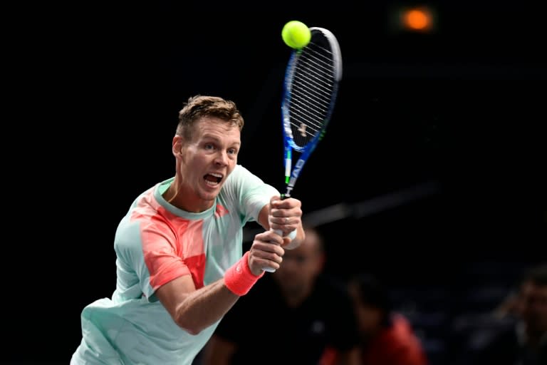 Czech Republic's Tomas Berdych returns the ball to Portugal's Joao Sousa at the ATP World Tour Masters 1000 indoor tournament in Paris on November 1, 2016