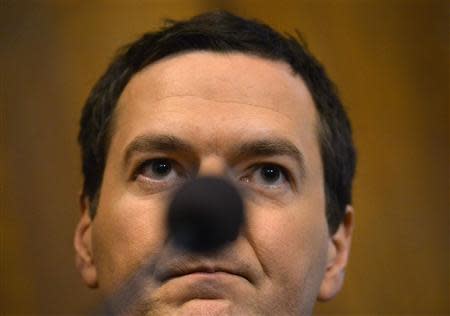 Britain's Chancellor of the Exchequer George Osborne addresses a conference on European Union reform, in central London January 15, 2014. Osborne said on Wednesday the legal treaties that dictate how the European Union is run were not fit for purpose and should be changed, saying he was determined his country would reshape its EU ties. REUTERS/Toby Melville