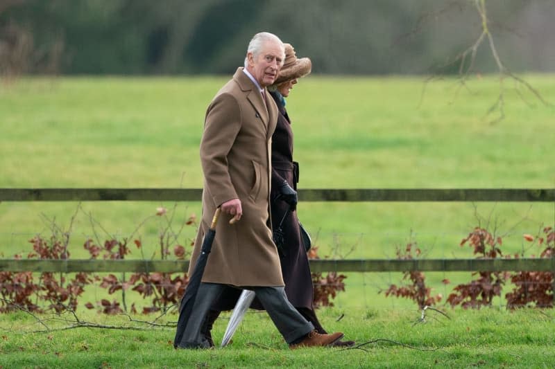 Britain's King Charles III and Queen Camilla arrive to attend a Sunday church service at St Mary Magdalene Church in Sandringham. Joe Giddens/PA Wire/dpa